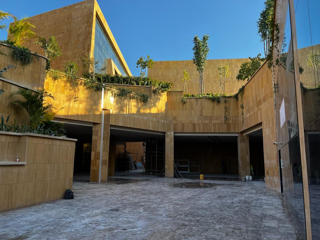 Via Riyahd stone facade with rooftop greenery